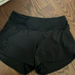 Black Lululemon Speed Up shorts. Size 4 Tall.